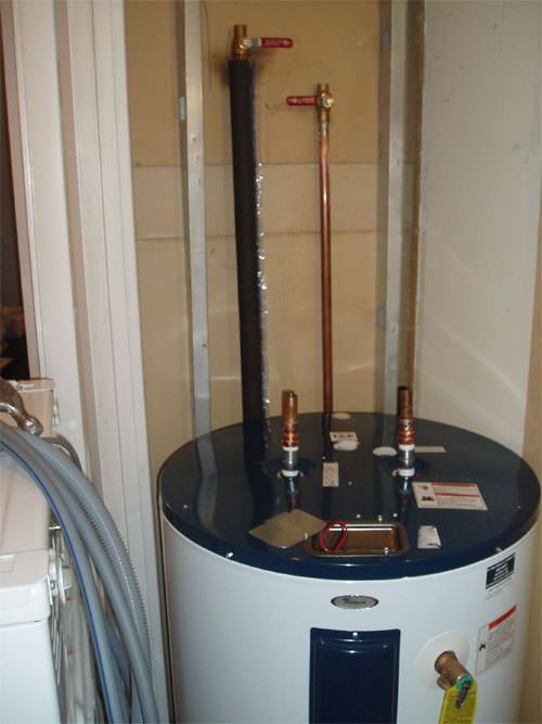 A water heater system (tank style) installed in a D.C. & MD home