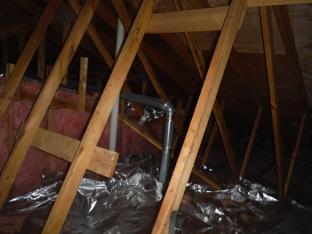Attic with old, insufficient insulation